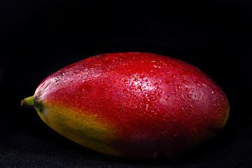 mango isolated on black background 