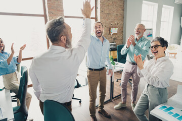 Poster - Photo of teamwork startup partners highfive deal success comfortable nice creative startup office loft room interior