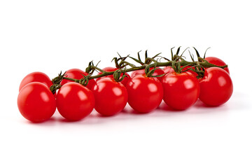 Bunch of tomatoes on the vine, isolated on white background.