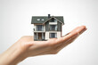 © ProArt Studios - Small house in the palm of your hand, property insurance, safe and wise investment, real estate