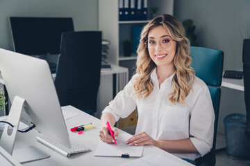 Photo of lovely young lady paperwork manager documents dressed formalwear comfortable startup office room interior