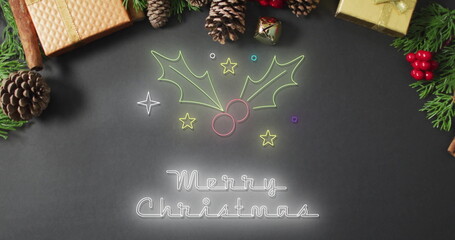 Canvas Print - Image of merry christmas text over christmas decorations