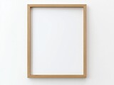 Minimalist wooden frame on a plain wall, ready for art or photo display.