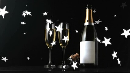 Poster - Animation of stars falling over glasses of champagne on black background