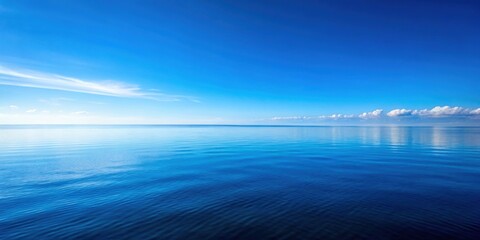 Clear blue sky reflecting off calm ocean water, serene, peaceful, tranquil, nature, outdoors, horizon, vacation, seascape