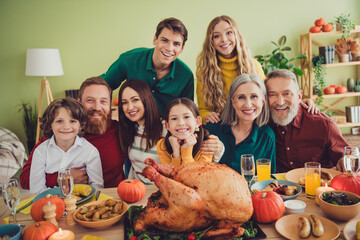 Canvas Print - Photo of good mood nice people celebrating thanksgiving day traditional family gathering indoors room home