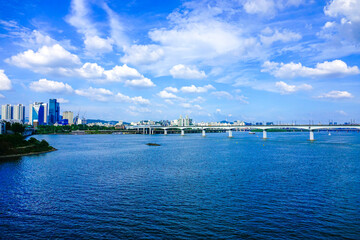 Yongsan-gu, Seoul, Korea - August 10, 2019: Dangsan Railway Bridge on Han River with the background of Seoul cityscapes