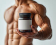 © B8stock - Muscular man holding dietary supplement jar