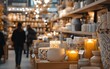 © Ahmadnawavi - A cozy home decor store with Black Friday discounts, warm lighting, shelves of discounted home accessories, and shoppers browsing through elegant items with stylish sale tags