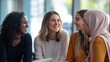 © sambath - Women of different ethnicities working together in a corporate office.