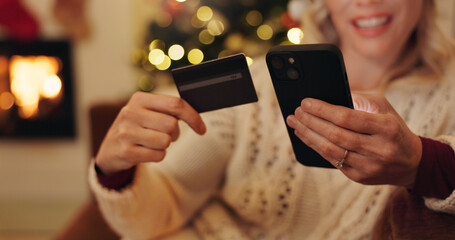 Canvas Print - Woman, hands and smartphone with credit card for Christmas shopping, sale and discount. Female person, apartment and smile or happy on internet or website for buying gifts, presents and payment