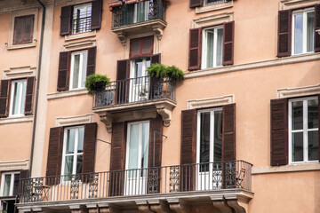 View of the facade of an old house in Rome, Italy