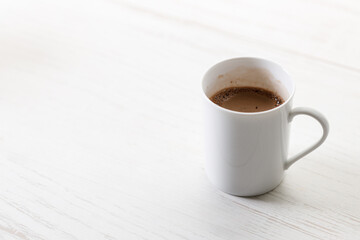 Cup of hot chocolate in white cereamic cup