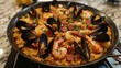 © midah - Delicious Seafood Paella in a Black Pan