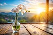 © box - White orchid flower in a glass vase with sunlight on wooden table Panoramic
