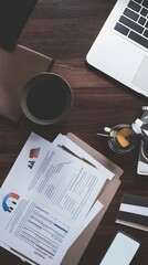 Poster - Top view of a workspace with a laptop, papers, and a cup of coffee.