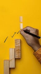 Wooden cubes with growing arrow on yellow background. Business growth concept 