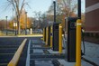 © juliars - Row of electric vehicle charging stations is waiting for drivers on a university campus