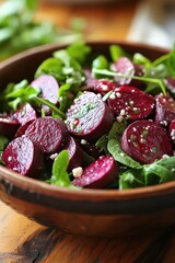 Wall Mural - Fresh beetroot and goat cheese salad with greens and nuts in a rustic bowl