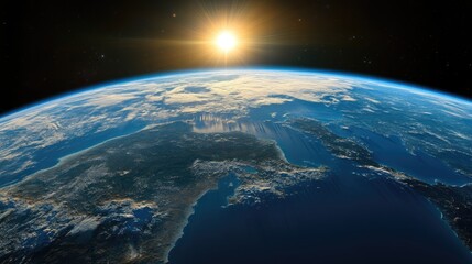 earth from space, sun rising over.