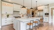 © Mr image - 72. A clean, modern kitchen with an empty island