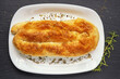 © Olga Iljinich - Balkan cuisine. Burek with cheese on white plate. Burek is filled pastry, popular national dish in Balkans