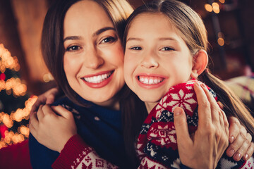 Canvas Print - Photo of nice small daughter mother cuddle cheerful smile wear christmas clothes enjoy cozy x-mas party decoration interior flat indoors