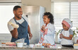 © DavisShared/peopleimages.com - Father, children and baking in home with dough, family bonding and together for food prep. Dad, kids and love for learning to cook in kitchen, playing and support with flour ingredients for pastry