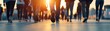 © JAKE STUDIO - Description:** A group of people walking towards the sunset, capturing a sense of movement and community in a bustling urban setting.