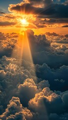 Wall Mural - sunrise above the clouds with golden rays