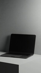 Laptop on solid color background with open screen, minimalistic style, copy space