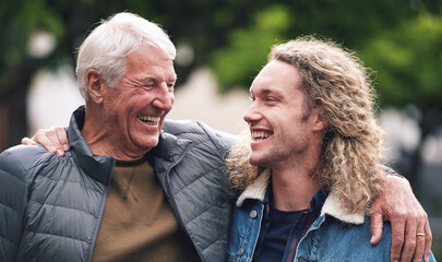 Sticker - Outdoor, senior father and man with hug for laughing, connection and bonding together with happiness. Park, dad and adult son with love embrace for joke, relationship and support as family in nature