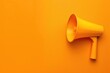 © Vii - Yellow megaphone on orange background