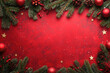 © romanets_v - Festive red christmas background with pine branches and decorations