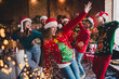 © deagreez - Photo of nice young people enjoy dancing good mood have fun cozy christmas decoration interior house indoors party