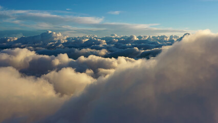 Wall Mural - aerial view of clouds at sunrise