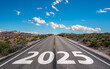 © AA+W - New year 2025 or start straight and beginning concept. number 2025 start written on the road at sunset with lens flare. Concept of challenge or career path, business strategy.