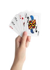 Wall Mural - Poker game. Woman holding playing cards on white background, closeup