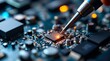 © Caspernik - close up of a electronic circuit board, repair of a computer, close up of a computer board soldering with soldering iron by technician