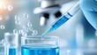 © feeling lucky - A close-up image of a scientist using a pipette to transfer blue liquid into a glass beaker, showcasing precision in the laboratory.