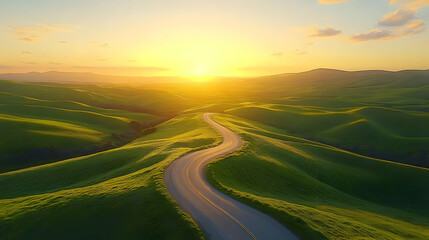 Wall Mural - Serene winding road through lush green hills at sunset.