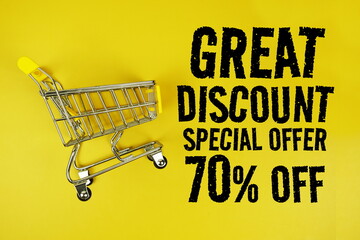 Wall Mural - Great Discount 70% Special Offer text with trolley shopping cart on yellow background