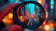 © Nicat - Close-up of a camera lens focusing on a vibrant cityscape.