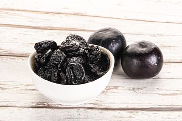 Wall Mural - Dry prunes in thw bowl