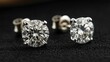 © theerachai - Diamond Earrings on Black Background