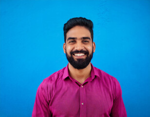 Wall Mural - Headshot Portrait of a Smiling Man with Contemporary Style, Isolated on Color Background with Ample Copy Space