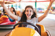 © PRASANNAPIX - indian girl enjoying on bumper car