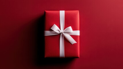 Classic red gift box with a white ribbon, perfect for holiday celebrations and customizable text space.