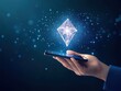 © Preeyanuch - A hand holding a smartphone displays a glowing diamond shape floating above, symbolizing technology and innovation.