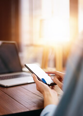 woman pointing on smartphone screen, chatting in social networks, meeting website, searching interne
